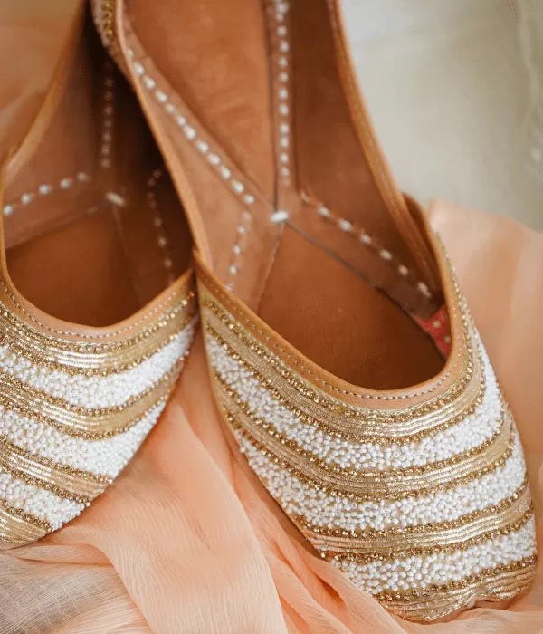 golden and white mojari