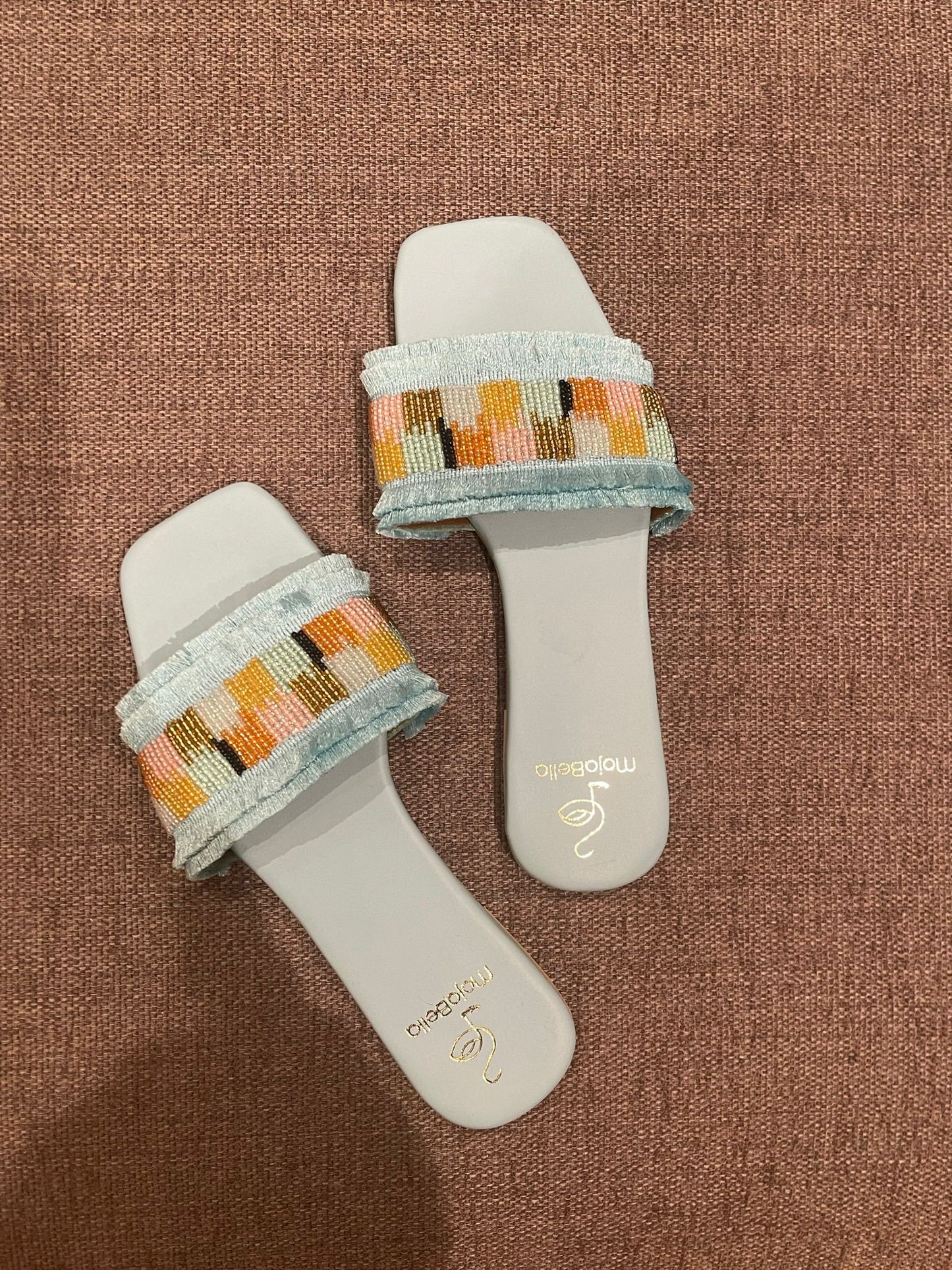 blue flat footwear