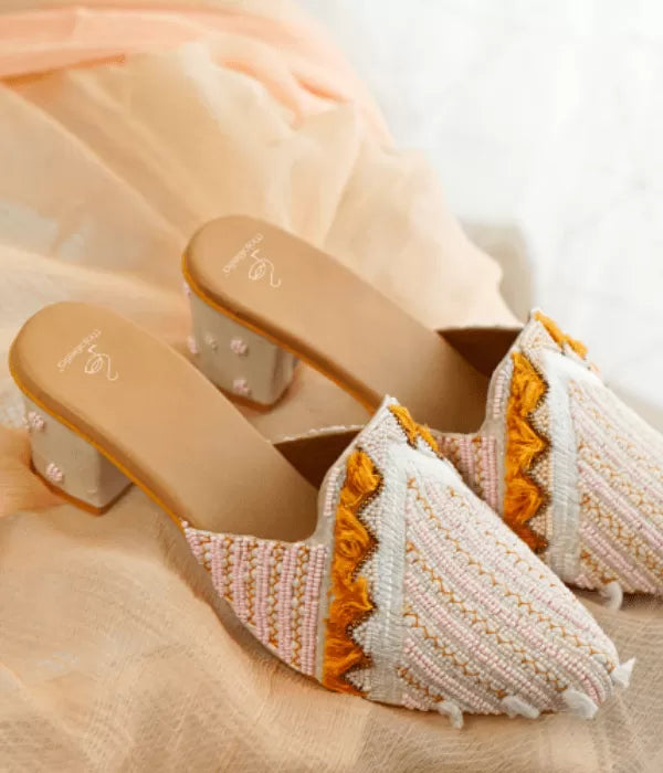 baby pink heels  with orange frills 